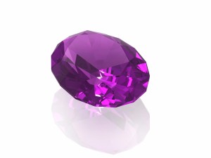 Amethyst gemstone isolated on white background